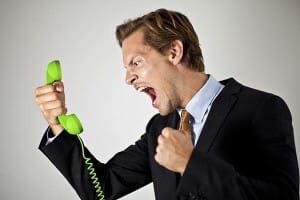 a man yells into a phone about Internet Marketing Myth #10
