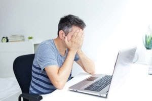 a man is distraught over Internet Marketing Myth #11